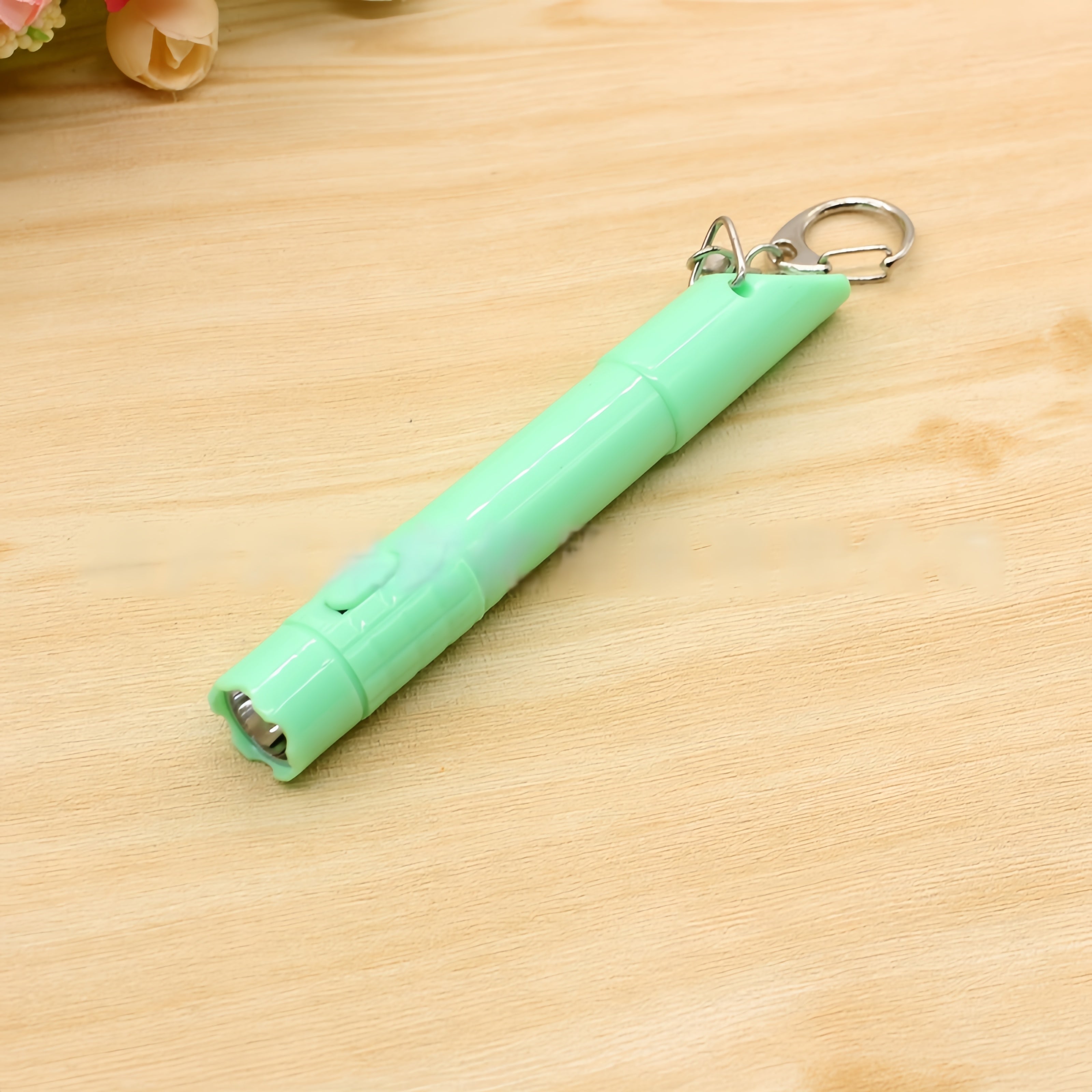 Whistle Pen With Flashlight Attached