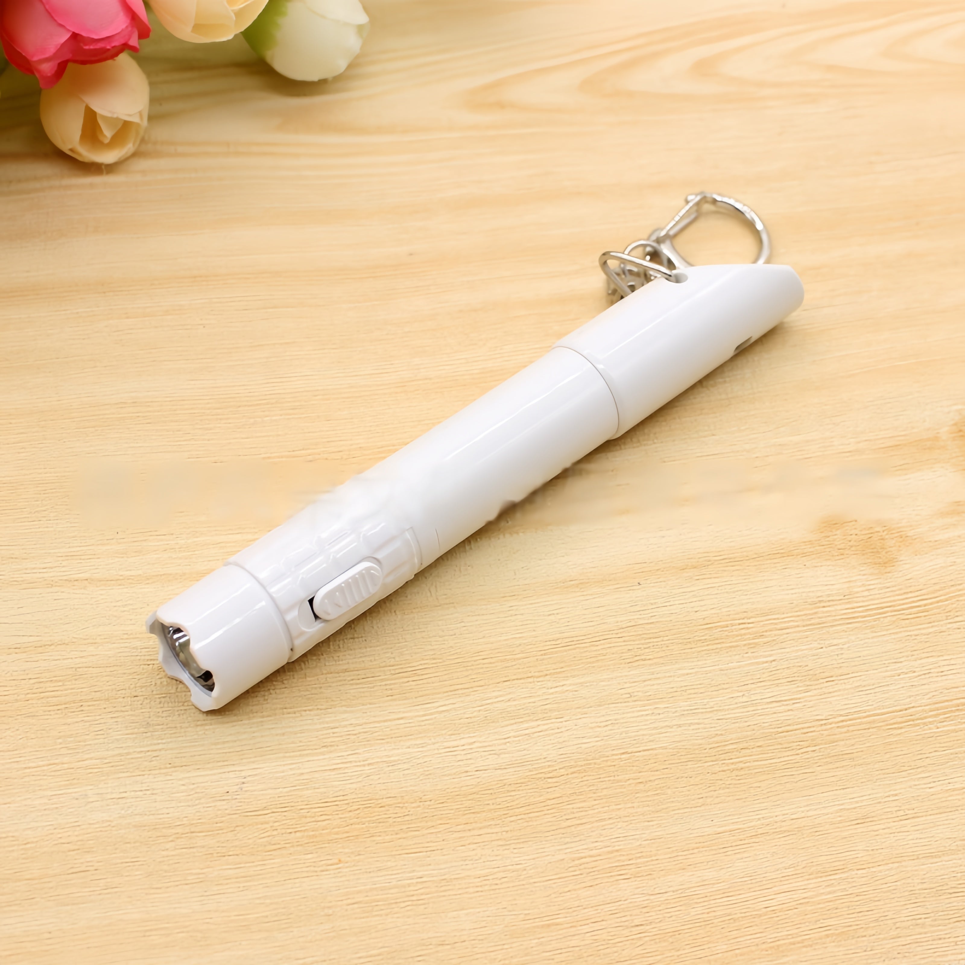 Whistle Pen With Flashlight Attached